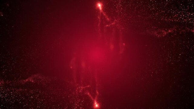 Abstract red glowing particles with bright light effects and dynamic motion on dark background