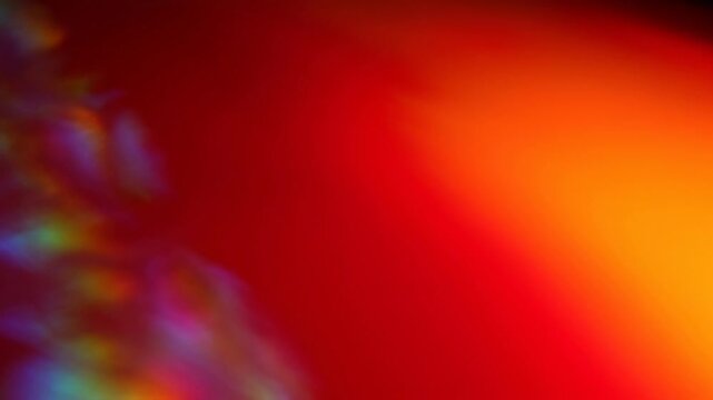 Abstract colorful gradient background with vibrant red orange and purple hues for creative design