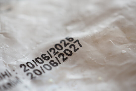 expire date printed on a piece of paper in close up