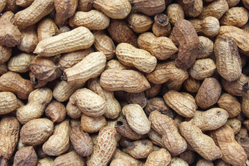 Obraz premium Whole Peanuts In Shell, Natural Texture Stack Background