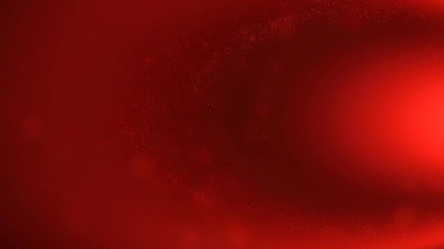 Abstract red glowing background with soft light and bokeh effects for festive and vibrant design