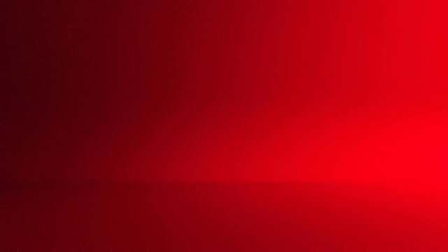 Bright red gradient background with smooth light transition and vibrant color for design and creative projects