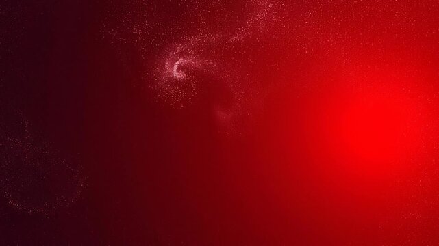 Red abstract background with glowing particles and soft light effects for modern design and digital art