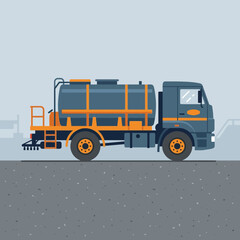 Fototapeta premium Industrial Asphalt Truck Performing Road Maintenance Duties With Precision