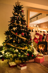 Fototapeta premium A decorated Christmas tree in the house