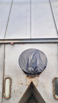 Bottom View of Industrial Metal Silo Hopper with Discharge Valves and Sight Glass Windows