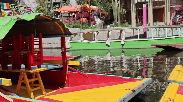 Close Up Colorful Trajinera Boat Docked Along Xochimilco Canal Mexico City