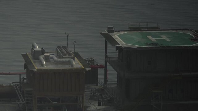 An oil platform is situated off the coast, with a helicopter landing area visible. Various structures are present on the platform, surrounded by calm water under daylight.