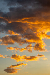 Fototapeta premium Golden Sunset Clouds in the Sky