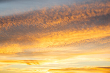 Fototapeta premium Golden Hour Sunset Clouds Background