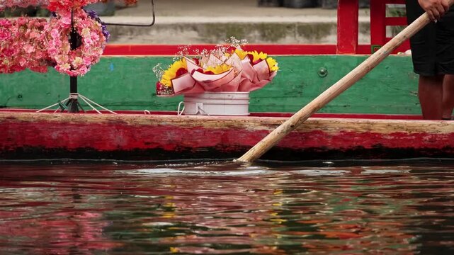 Detail of Flower Decorated Trajinera and Oar Canal Xochimilco Mexico City