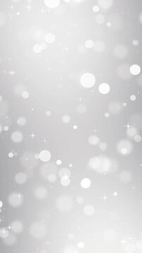 Silver Bokeh Lights with Sparkling Stars and Snow fall animation, Elegant White Christmas and Winter New year Holiday Stream Vertical Social media Motion Background