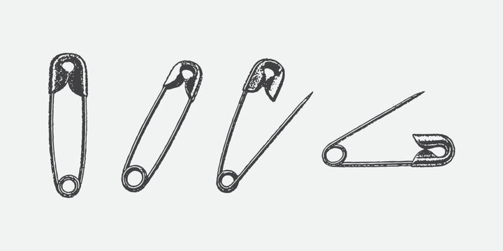 Safety pins that have been punctured with needles and opened and closed