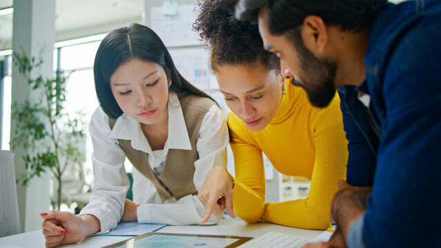 Group of creative Businesspeople brain storm meeting presentation,discussing roadmap to product launch, planning,strategy,dashboard,new business development,working with new startup project in office