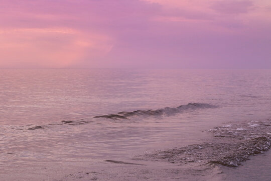 pastel colours calm sunset over the sea 