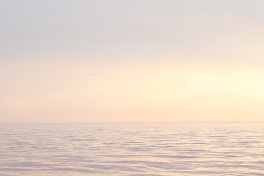 pastel colours calm sunset over the sea 
