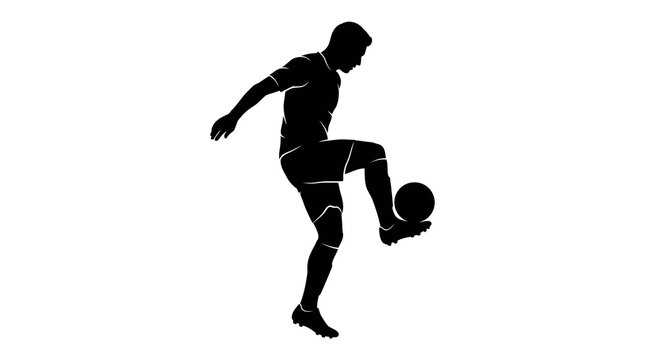 A powerful soccer player is captured in silhouette during the heat of action kicking a ball with intense energy and unwavering focus on