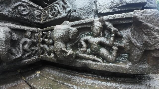 Deeply Carved Wet Stone Bas Relief Figurines at Shri Ambareshwar Shiva Temple, Maharashtra, India 