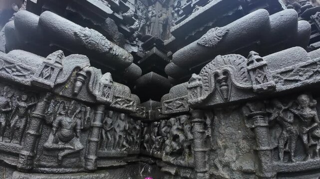 Deeply Carved Wet Stone Bas Relief Figurines at Shri Ambareshwar Shiva Temple, Maharashtra, India 