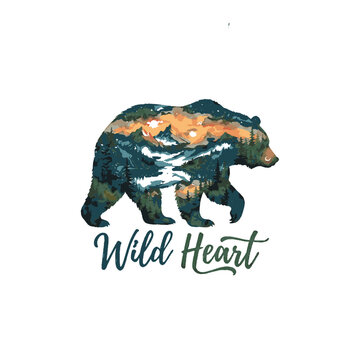 Bear silhouette with mountain forest landscape and Wild Heart typography design