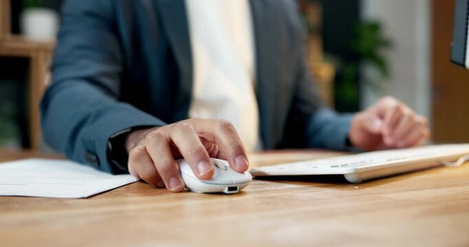 Businessman, hands and mouse with computer in office for research, company tasks or agenda. Man, employee or scrolling with technology for online browsing, email or network connection in workplace