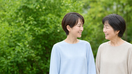 Fototapeta premium Japanese Women Connecting in a Community Garden with Copy Space