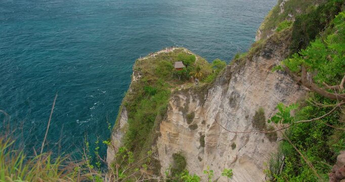 Famous Tree House Overlooks Dramatic Coastal Cliffs At Thousand Islands Viewpoint In Nusa Penida Bali
