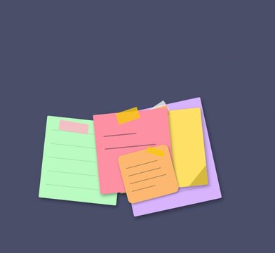Colorful sticky notes and paper memos arranged in a messy pile for reminders and task planning on a dark background for office organization and creative project management