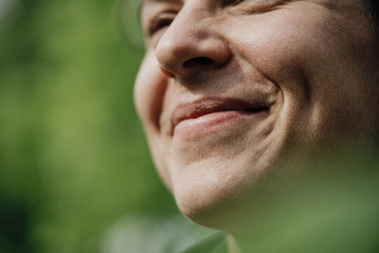 Close up of a smiling woman with dimples