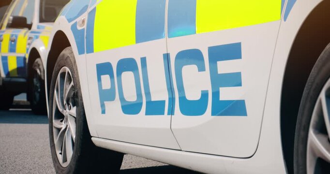 Police car &ndash; UK emergency services police force vehicles featuring law enforcement cop cars in response to an incident from team at local police station.