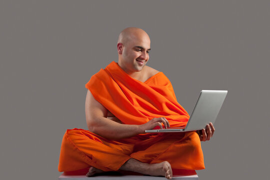 Monk with a laptop 
