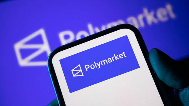 Polymarket betting platform logo on smartphone screen for decentralized finance and crypto prediction market.