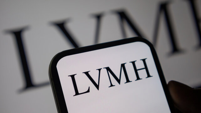 Lvmh moet hennessy louis vuitton luxury group logo shown on phone for high end fashion and retail industry coverage.