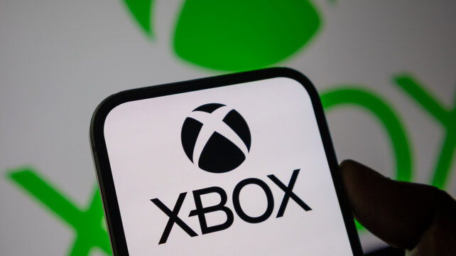 Xbox gaming console brand logo in green and white colors on mobile device for video game industry and entertainment news.