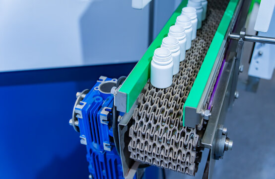 conveyor line for the production of plastic bottles close-up