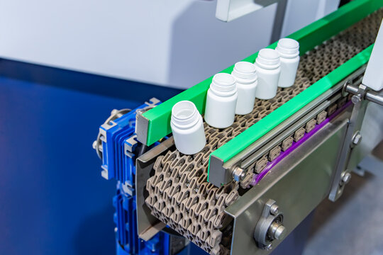 conveyor line for the production of plastic bottles close-up