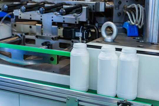 conveyor line for the production of plastic bottles close-up