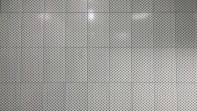 Side view of white or gray ceramic walls. front. close up. copy space, empty, free, negative, text, design. backgrounds. grey. nobody, no people. light, bright. home, house. floor.
