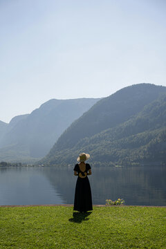 Woman in Black Dress by Serene Lake
