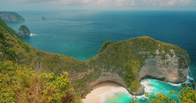 Aerial view of Kelingking Beach beautiful Indonesian coastline in Nusa Penida Bali
