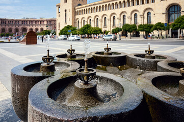 A several drinking fountains installed in the city square. © SKfoto GE