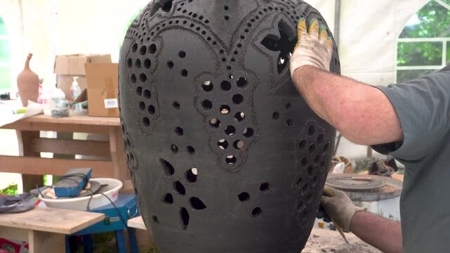 Potter Crafting a Large Ceramic Vase