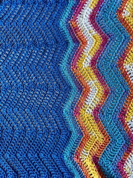 colorful knitted chevron pattern textile background 