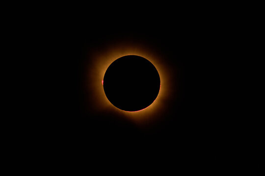 Total solar eclipse showcasing sun's burning corona