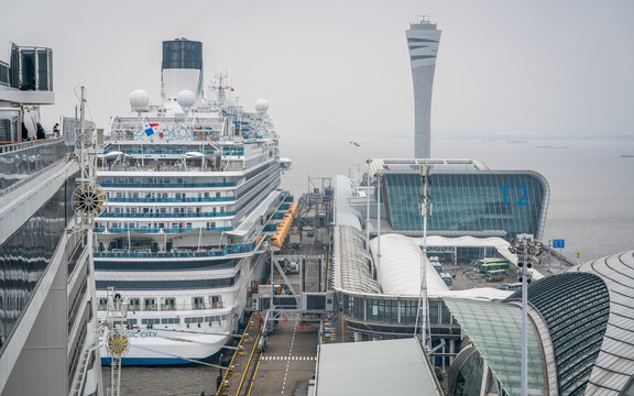 Rear view of Adora magic city cruise ship and Baoshan Wusongkou international port and cruise terminal in Shanghai China