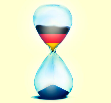 Hourglass with German flag showing time running out for politics