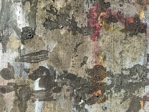 A weathered concrete surface covered with dense moss growth and rough textures.