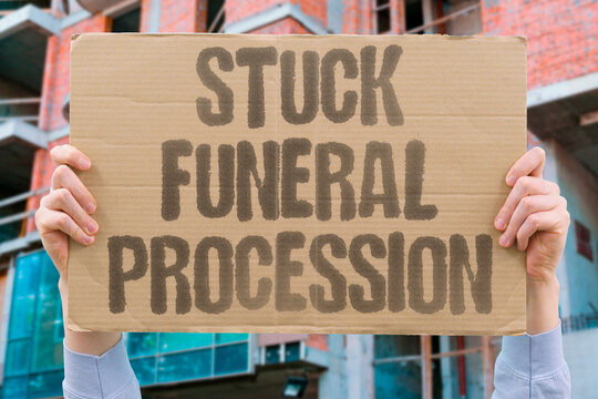 "Stuck Funeral Procession" Traffic halted by ceremonial motorcade. STUCK. FUNERAL. PROCESSION. TRAFFIC. HALTED.
