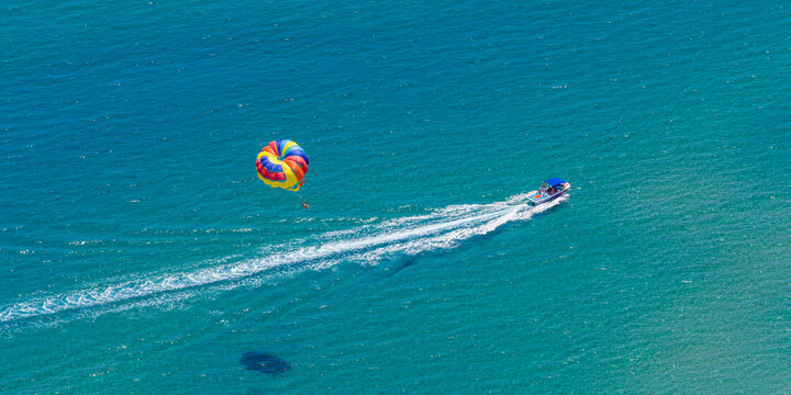 Parasailing, motorboat