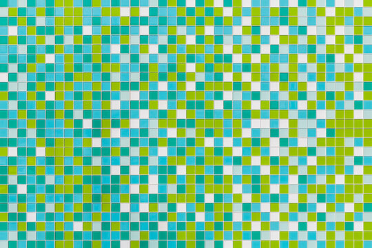Coloured tiles made of glass